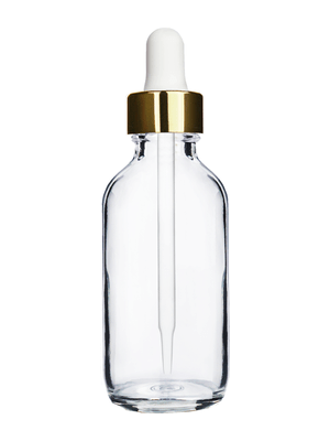 Boston round design 60ml, 2oz Clear glass bottle and white dropper with a shiny gold trim cap.