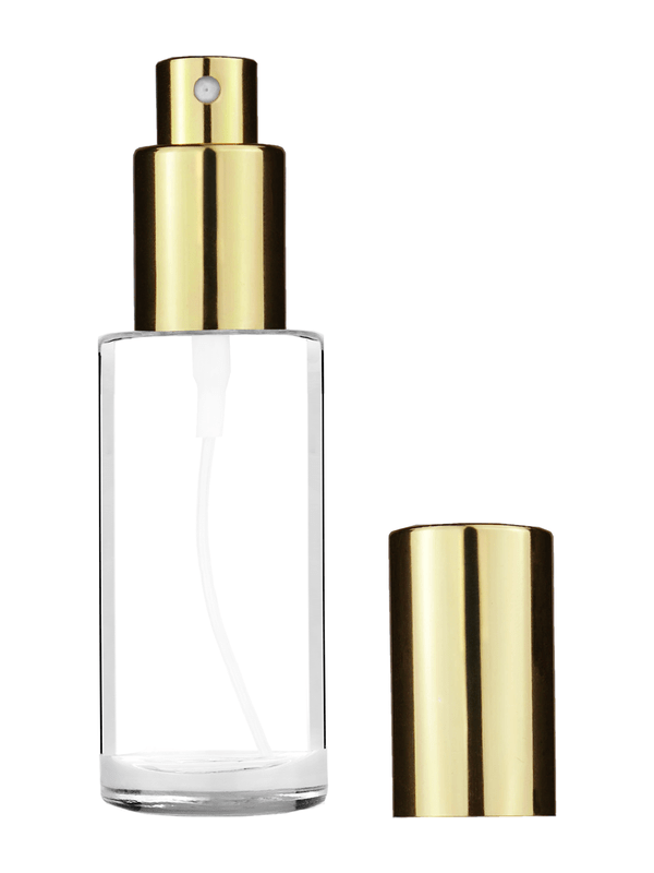 Cylinder design 25 ml  clear glass bottle  with shiny gold spray pump.