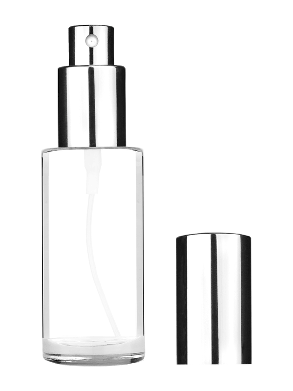 Cylinder design 25 ml  clear glass bottle  with shiny silver spray pump.