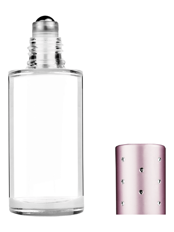 Cylinder design 9ml Clear glass bottle with metal roller ball plug and pink cap with dots.