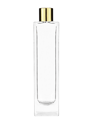 Sleek design 100 ml, 3 1/2oz  clear glass bottle  with reducer and shiny gold cap.