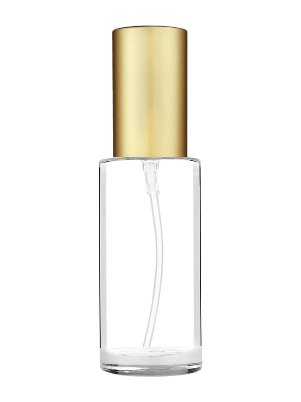 Cylinder design 25 ml  clear glass bottle  with matte gold lotion pump.