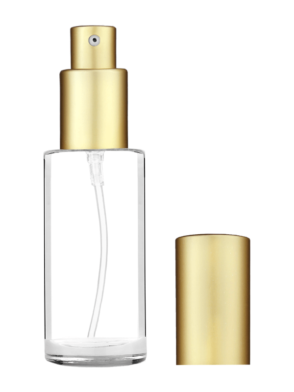 Cylinder design 25 ml  clear glass bottle  with matte gold lotion pump.