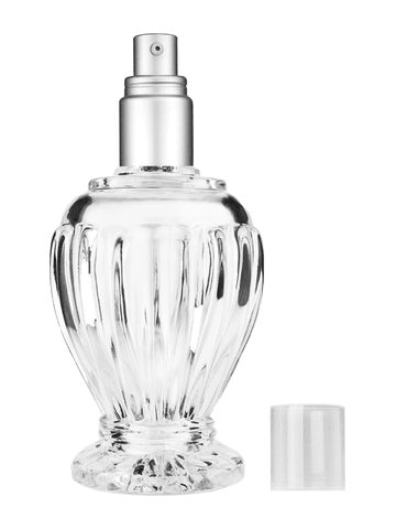 Diva design 100 ml, 3 1/2oz  clear glass bottle  with with a matte silver collar treatment pump and clear overcap.