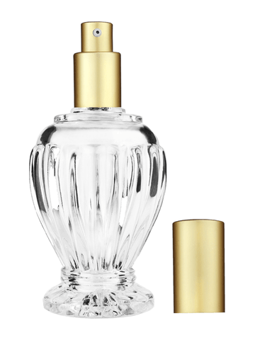 Diva design 100 ml, 3 1/2oz  clear glass bottle  with matte gold lotion pump.