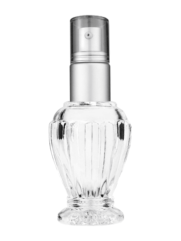 Diva design 30 ml, 1oz  clear glass bottle  with with a matte silver collar treatment pump and clear overcap.