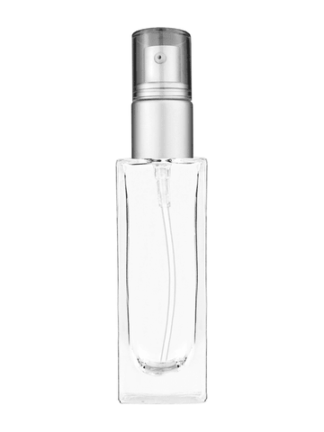 Sleek design 30 ml, 1oz  clear glass bottle  with with a matte silver collar treatment pump and clear overcap.