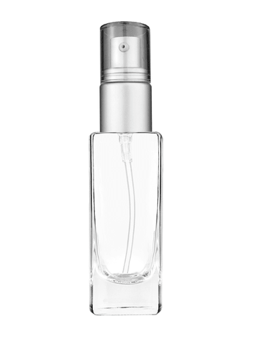 Slim design 30 ml, 1oz  clear glass bottle  with with a matte silver collar treatment pump and clear overcap.